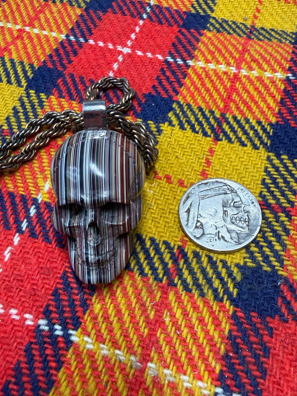Hand-Carved Fordite Skull Pendant By Mark Noll
