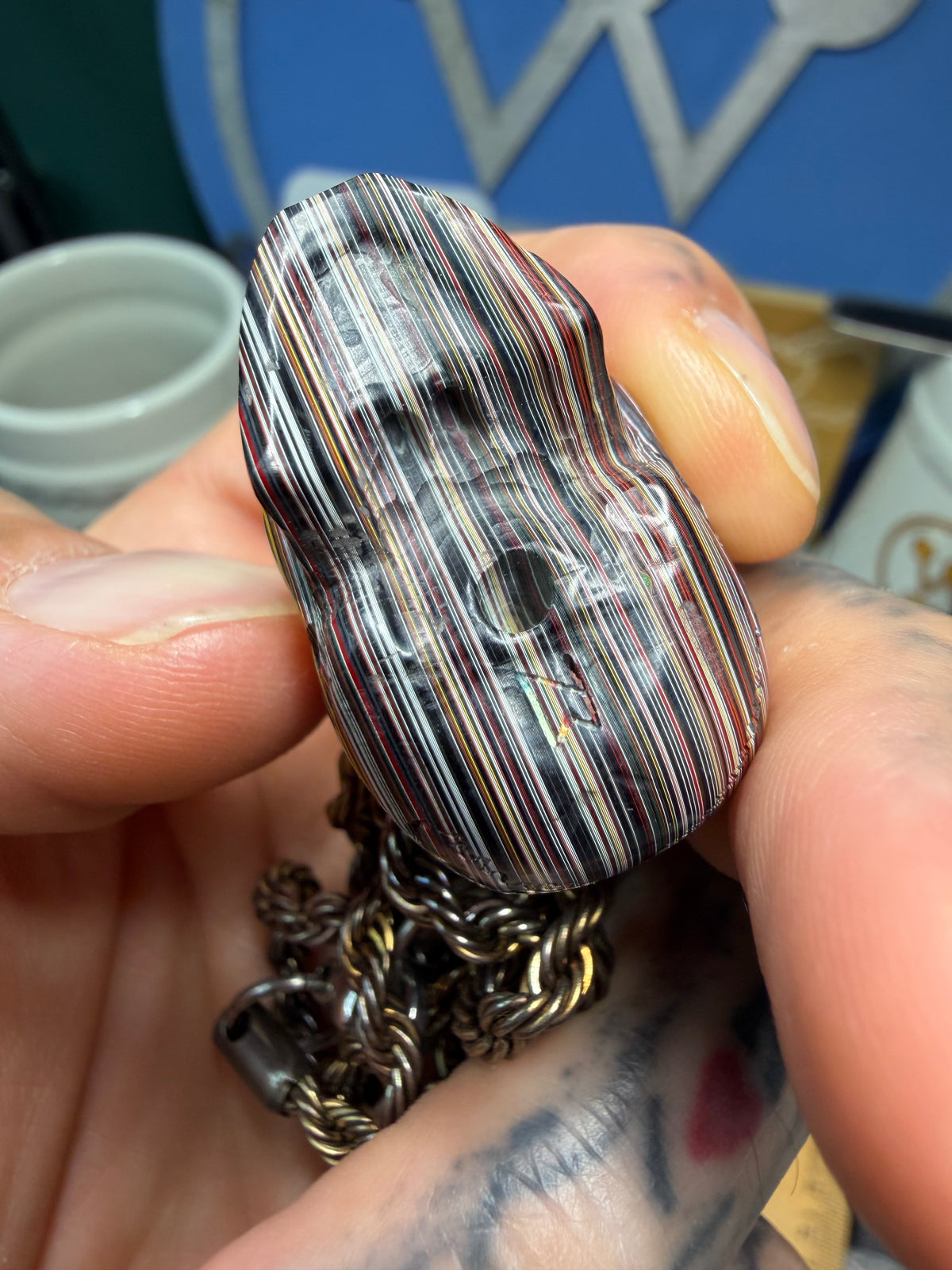 Hand-Carved Fordite Skull Pendant By Mark Noll