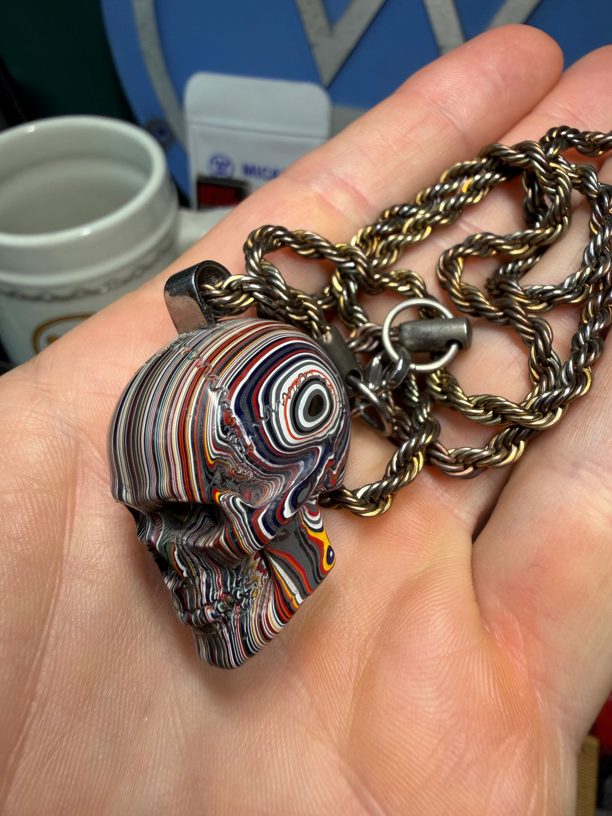 Hand-Carved Fordite Skull Pendant By Mark Noll